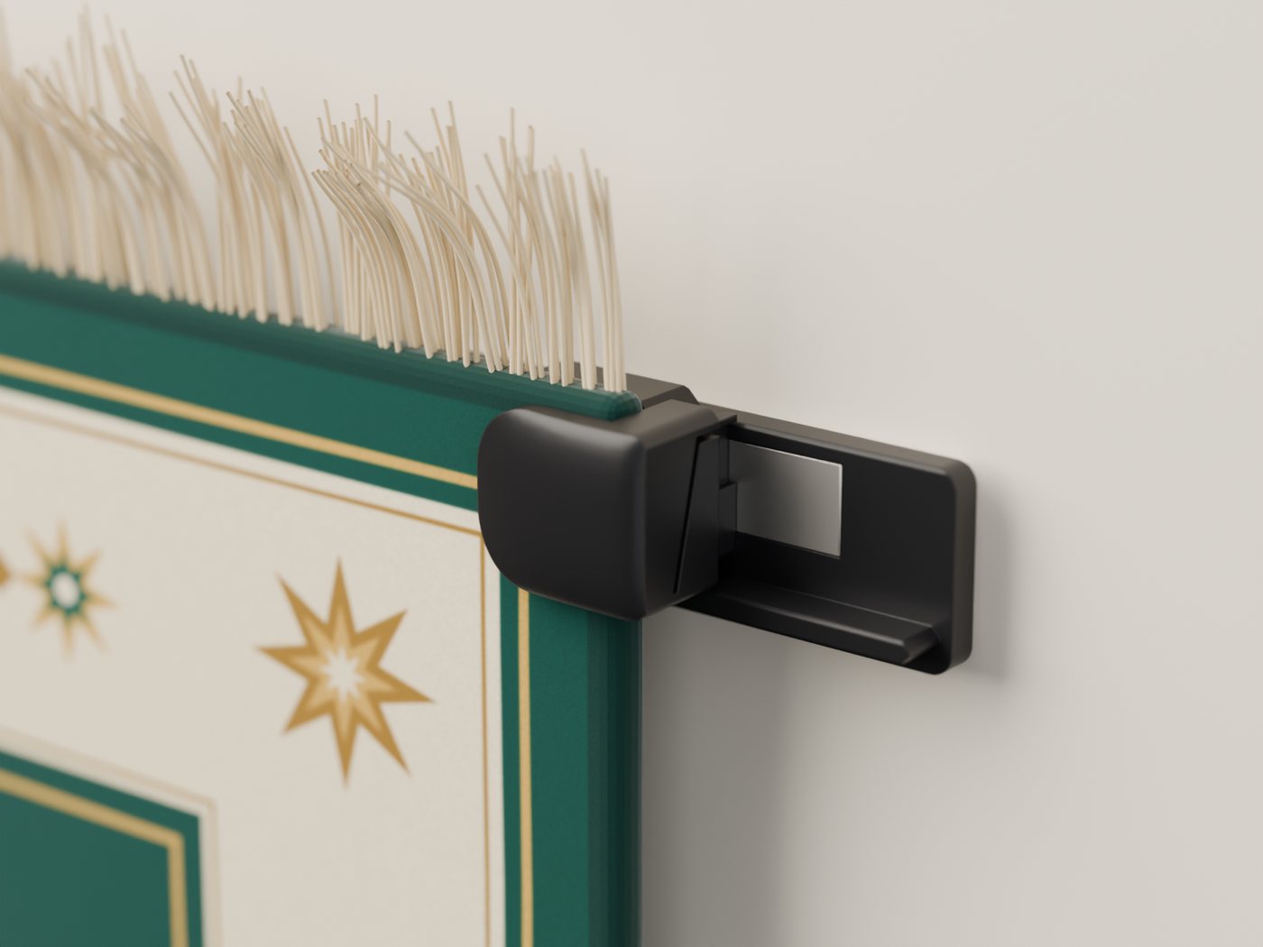 Close-up of a clamp at the top corner of a hung prayer mat, sitting on its wall mount